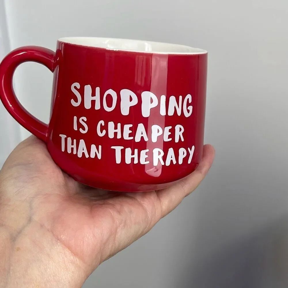 Whimsical “Shopping is cheaper than Therapy”cup.